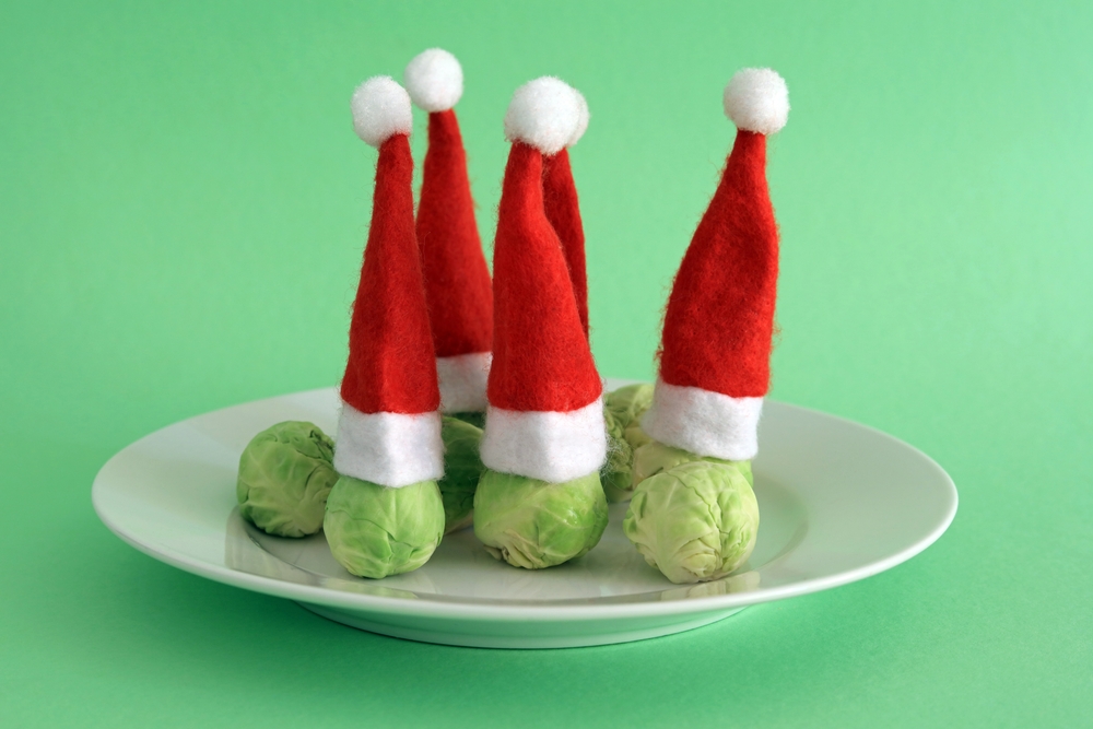Brussels sprouts wearing Santa hats