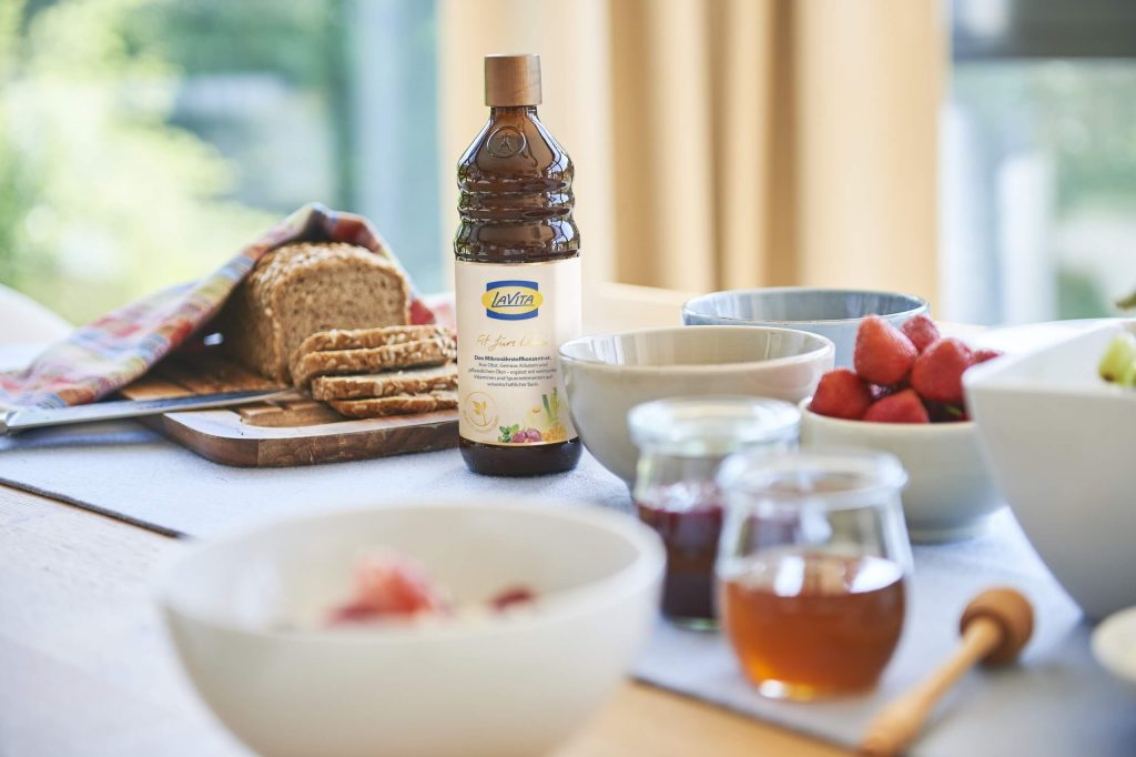A bottle of LaVita micronutrient concentrate on a breakfast table